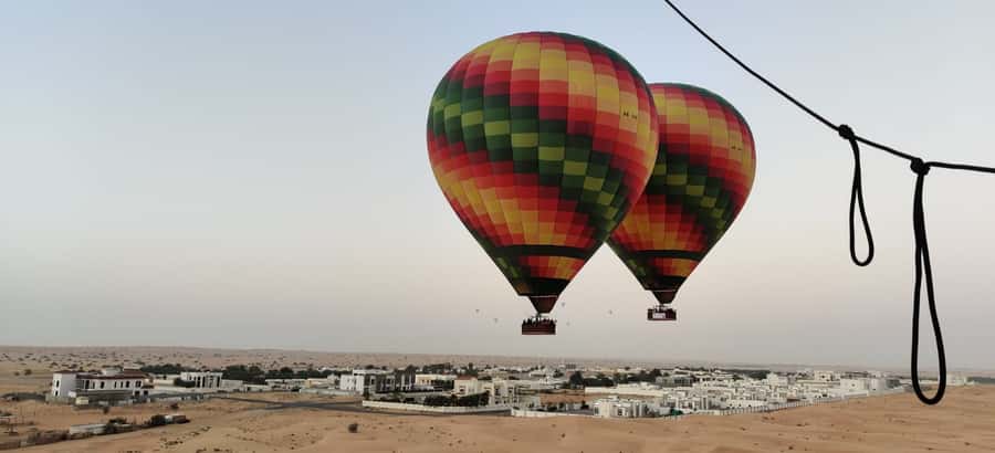 Dubai: Hot Air Balloon, Camel Ride, Desert Safari & More - Transport, timing, and the five-hour promise
