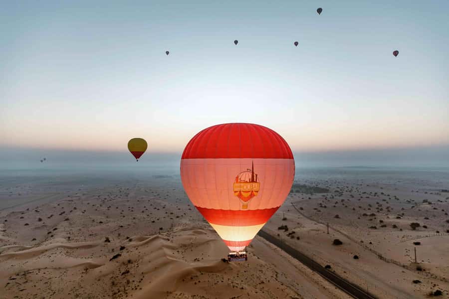 Dubai: Hot Air Balloon Ride with Camel Ride & Falcon Show - Landing, camel riding, and the horse activity