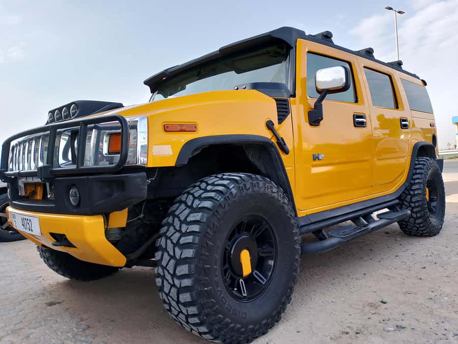 Dubai Hummer Safari Adventure & Traditional Dress Photoshoot - Lahbab Desert: dunes, photos, and a little sandboarding