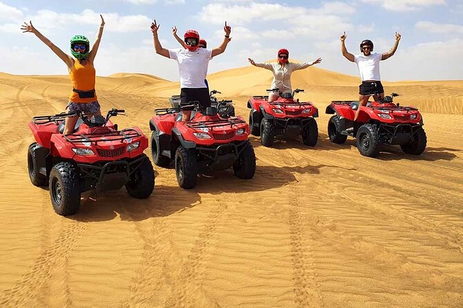 Dubai: Jeep Desert Safari, Camel Ride, and Quad Bike Tour - Quad biking with a helmet and safety briefing