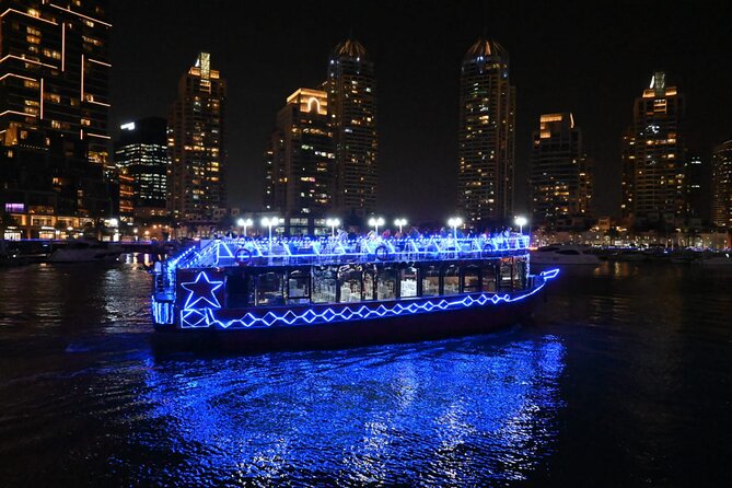 Dubai Marina Unique Dhow Cruise Buffet Dinner and Belly Dance - Cayan Tower from the water