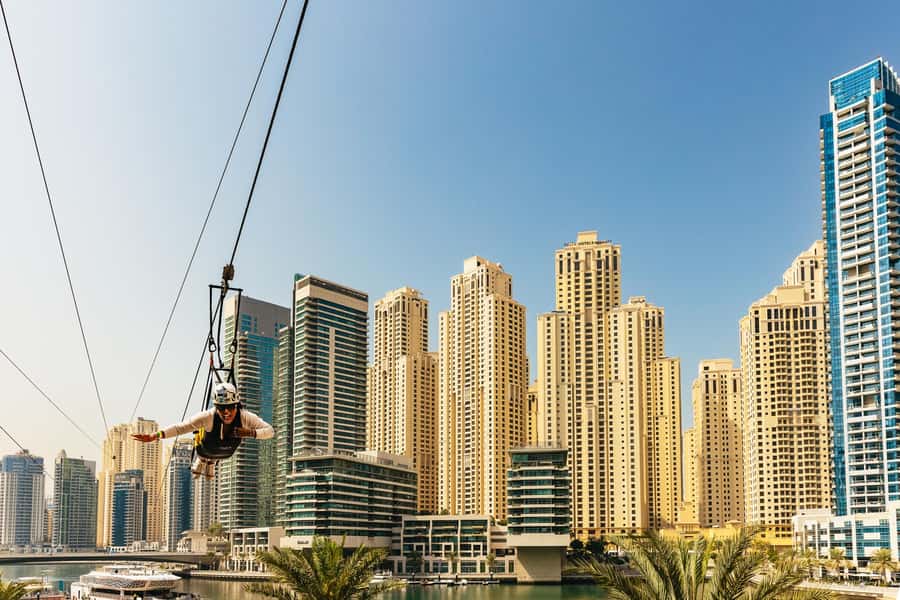 Dubai: Marina Ziplining with Photos, Video and Meal - Riding beside a friend on the parallel line