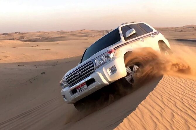 Dubai Morning Desert Safari: Camel Ride & Sandboarding! - Sandboarding on soft red sand