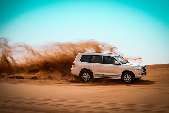 Dubai Morning Evening Desert Safari,Sand boarding and Camel ride - Reaching the high red dunes of Lahbab