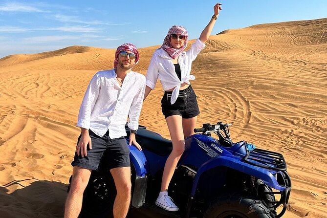 Dubai: Morning Quad bike & Safari Adventure , Sandboarding, camel - Photo stops and help from the guide