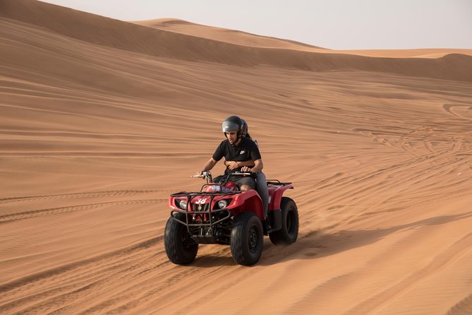 Dubai Morning Quad Bike with Sandboarding and Camel Ride - Leaving Dubai behind in an air-conditioned 4WD