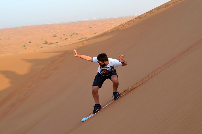 Dubai Morning Quad Bike with Sandboarding and Camel Ride - One hour on the quad bike