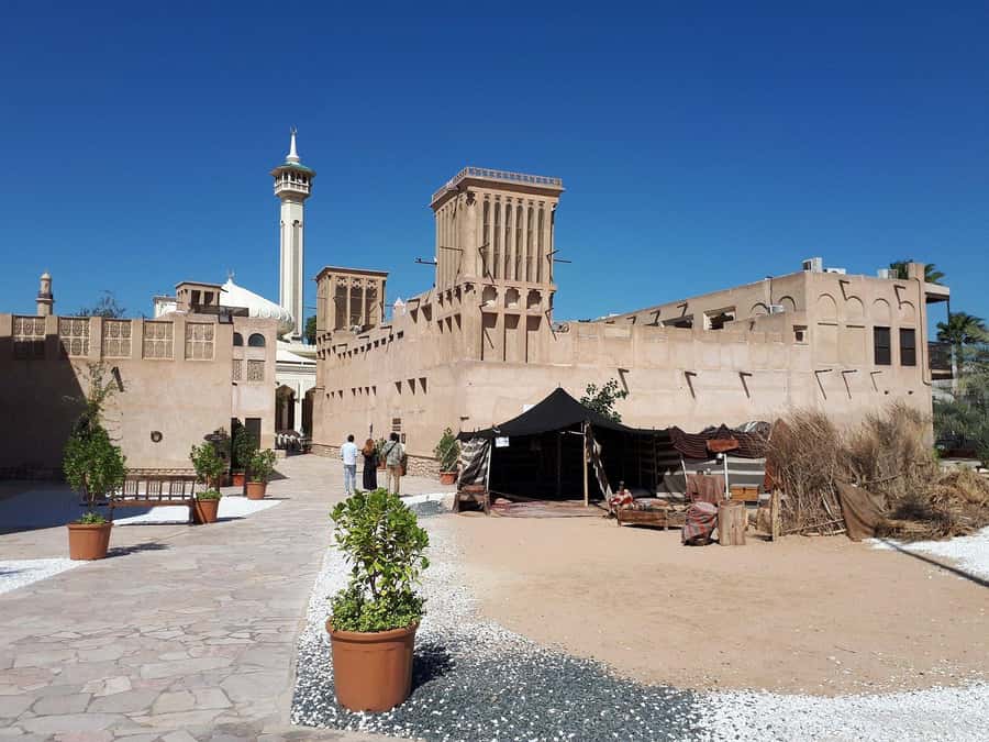 Dubai: Old City Walking Tour with Abra Ride - The Old Textile Market and the shift toward Deira