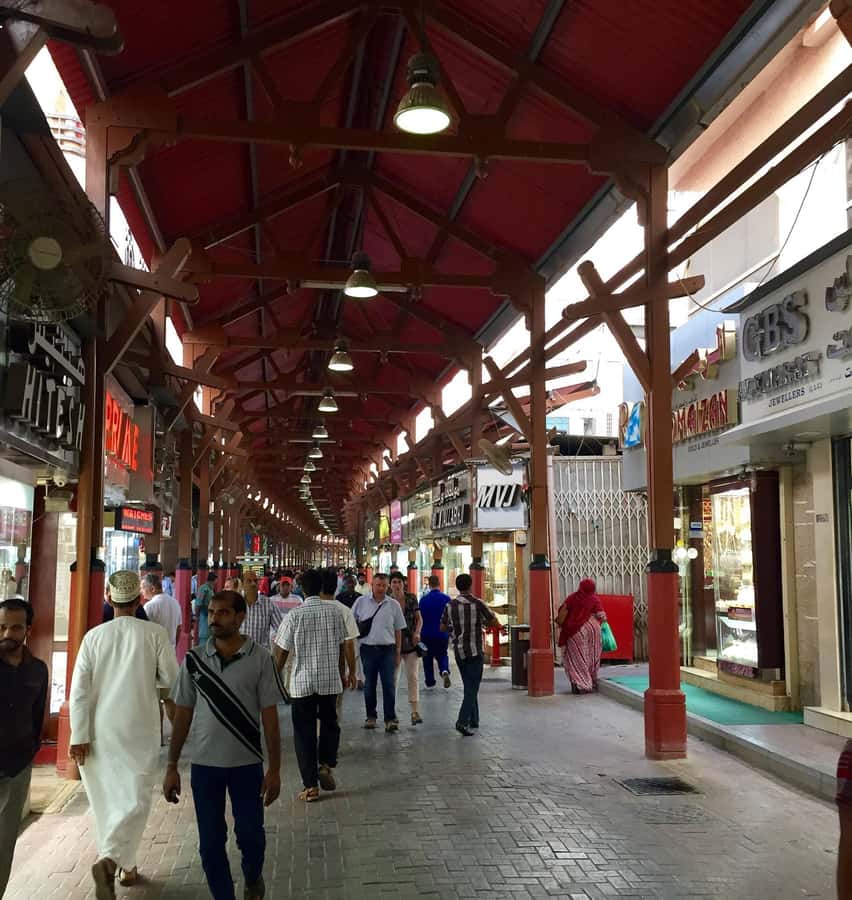 Dubai: Old City Walking Tour with Abra Ride - Gold Souk: a glittering finish