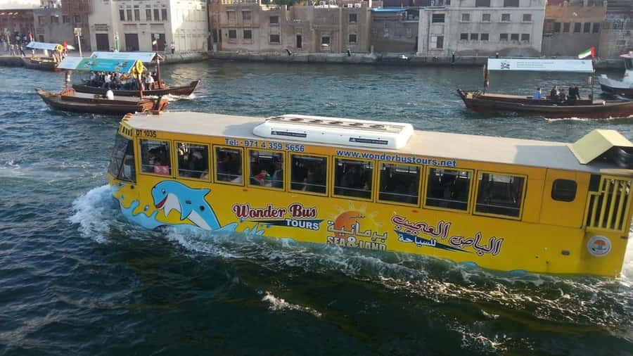 Dubai: Old town tour with Wonder Bus, souks, Creek and Guide - The textile market and Heritage Village