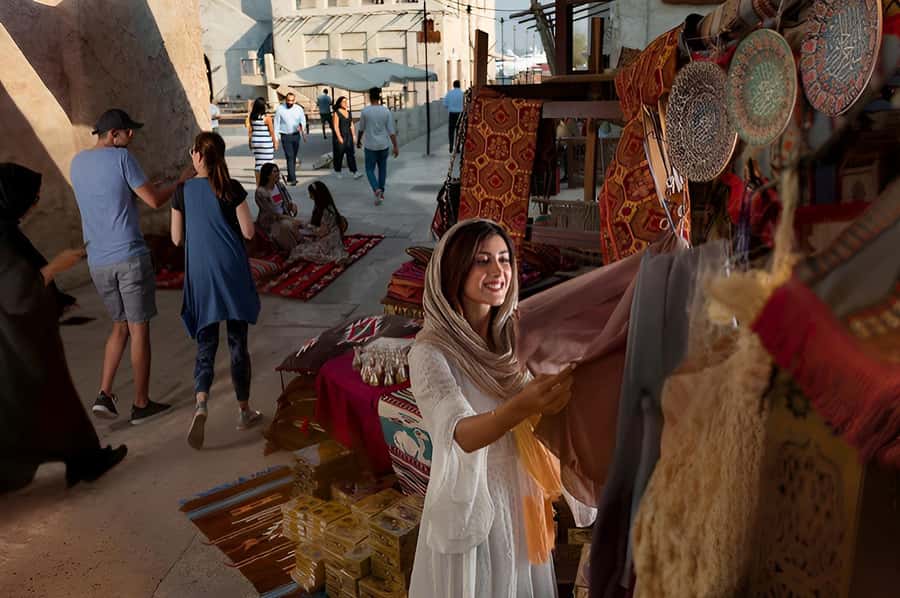 Dubai: Old Town Walking Tour with Abra Cruise & Street Food - Textile Souk: color, fabric, and useful advice