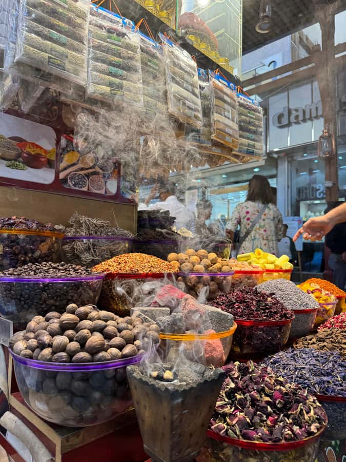 Dubai: Old Town Walking Tour with Abra Cruise & Street Food - Crossing Dubai Creek by abra