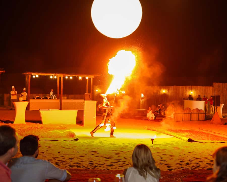 Dubai: Premium Desert Safari, Camel Ride, BBQ & Sandboarding - Three-course BBQ dinner under the stars