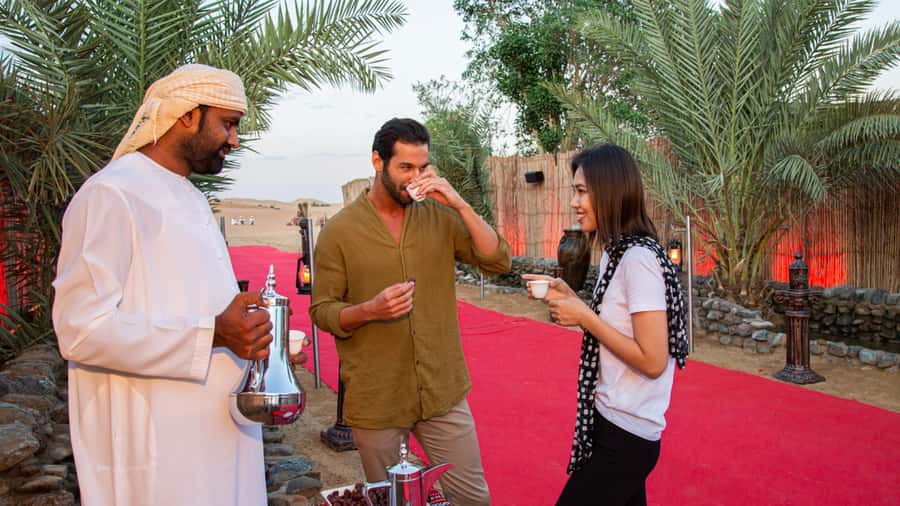Dubai: Premium Desert Safari, Camel Ride, BBQ & Sandboarding - Tanoura, belly dancing, and fire