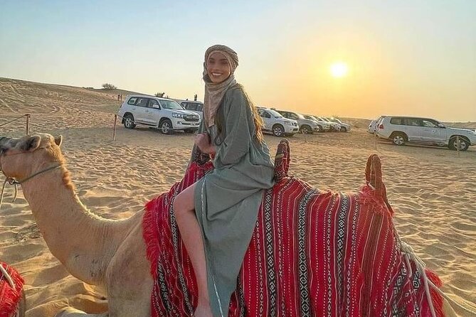 Dubai Premium Desert Safari – Live Buffet Dinner & Luxury Camp - Sandboarding offers a quieter desert thrill
