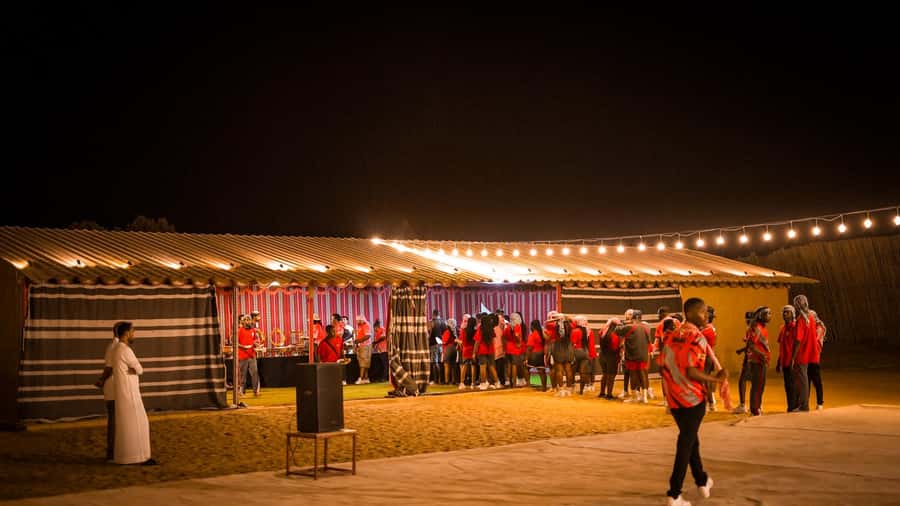 Dubai: Premium Red Dune Safari with Sandboarding & BBQ - Camel rides, henna, and the Bedouin-style camp