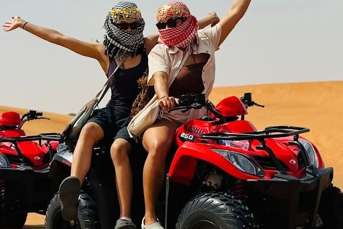 Dubai Premium Red Dunes Safari Camel Ride and BBQ Dinner - Belly dancing, Tanoura, and the fire show