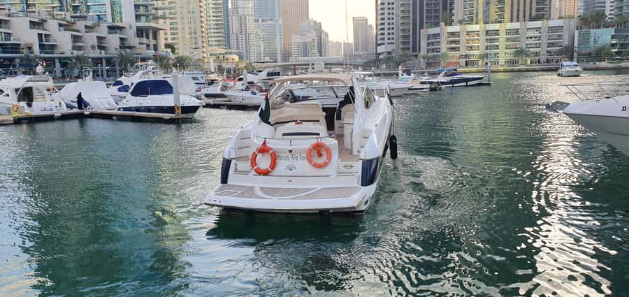 Dubai: Private Boat Cruise from Dubai Marina up to 12 people - Swimming, sun, music, and the BBQ option
