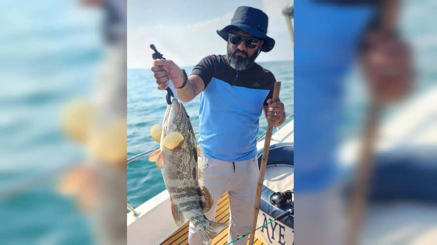 Dubai: Private Deep Sea Fishing Trip with BBQ of Catch - Captain Sathish and the hands-on crew