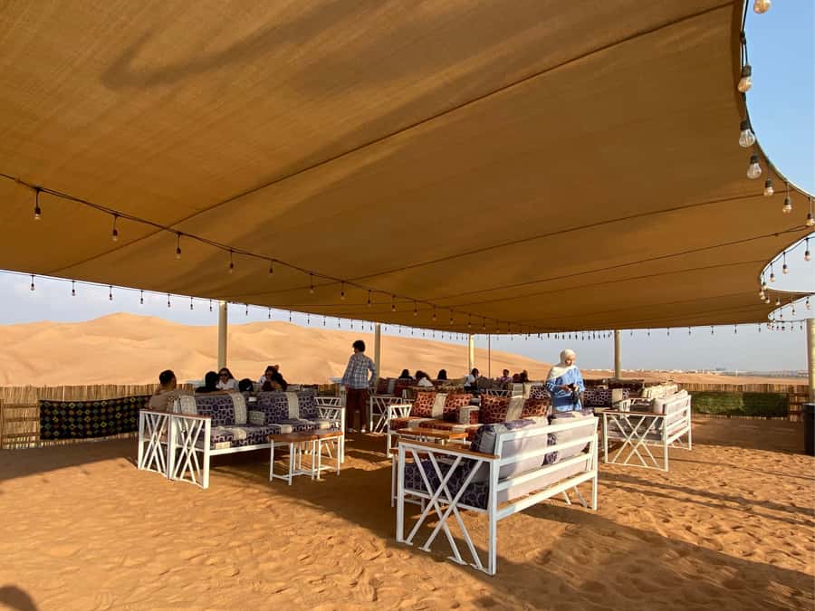 Dubai: Private Desert Buggy Tour, Camel Ride & Sandboarding - What happens at the base camp