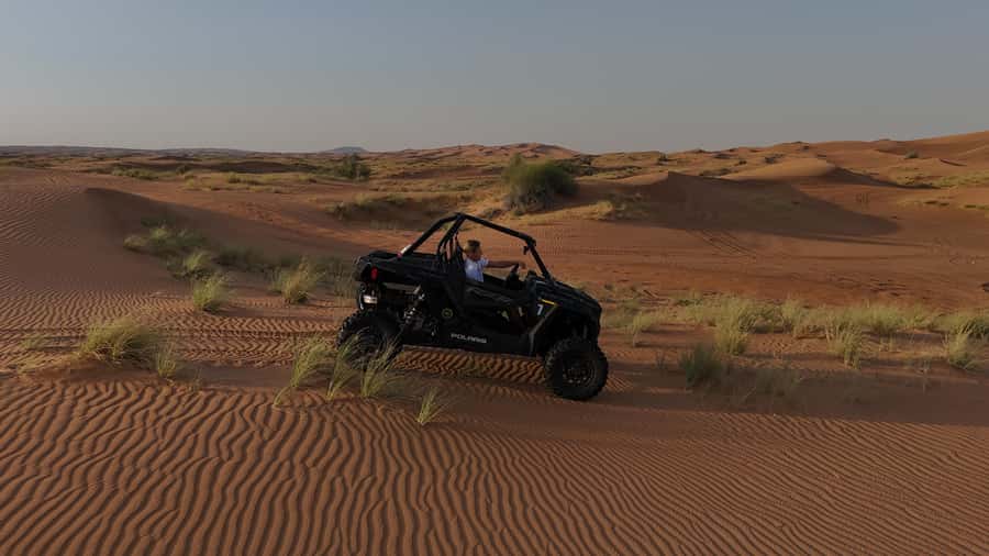 Dubai: Private Dune Buggy, Camel Ride, and Sand Boarding! - Meeting John the camel after the ride
