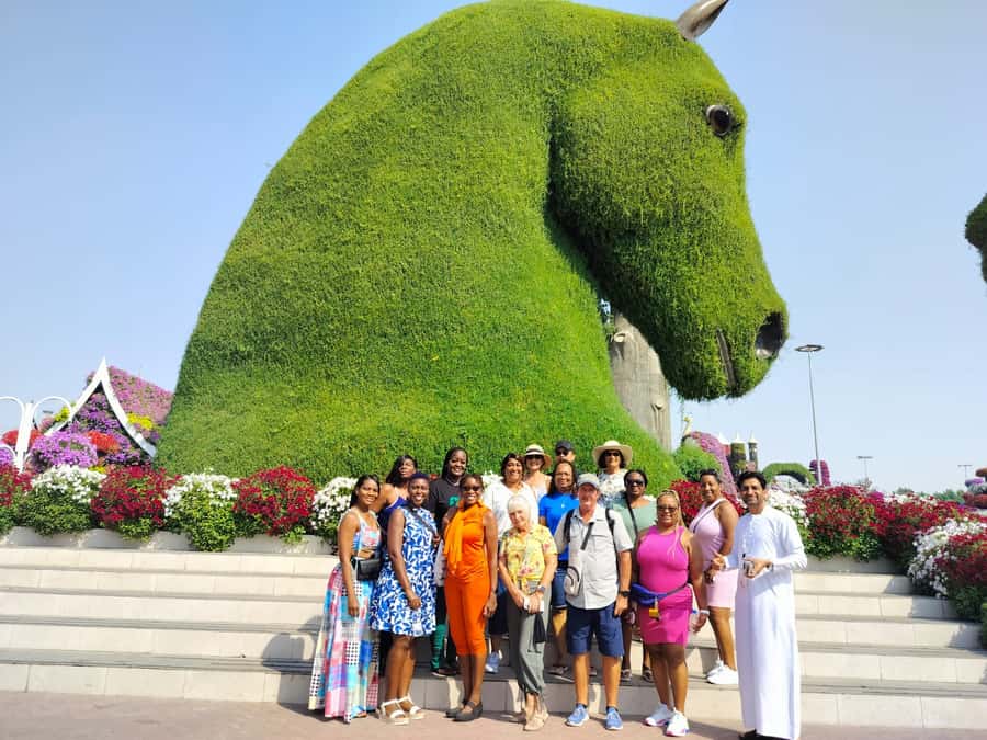 Dubai: Private Miracle Garden & Global Village Trip - Global Village: shopping, food, rides, and shows