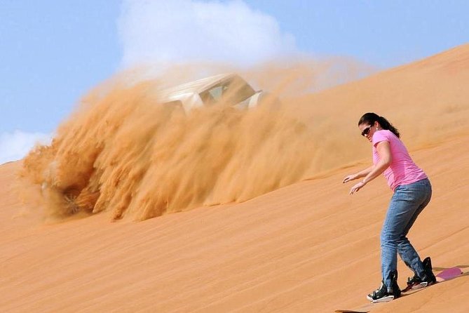 Dubai Private Morning Desert Safari: Camel Ride & Sandboarding - A high dune photo stop at sunrise