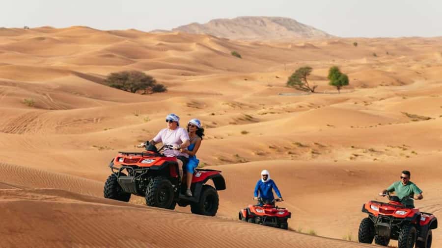 Dubai: Quad Bike, Dune Buggy, and Sandboarding Experience - A 15-minute camel ride with a different pace