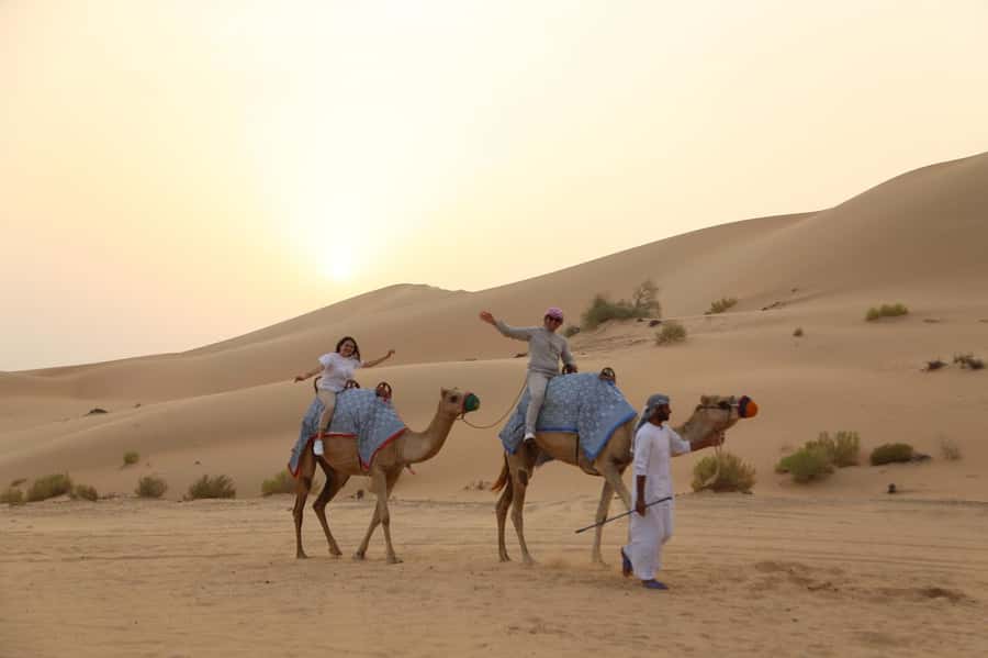 Dubai: Quad Bike or Dune Buggy Adventure & Optional Transfer - Riding across Lehbab’s red dunes