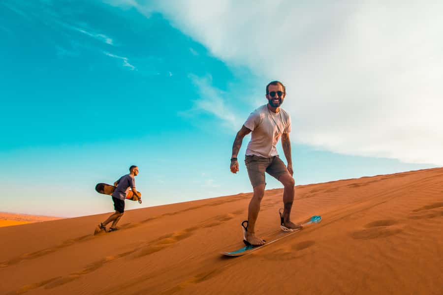 Dubai: Quad Bike Safari, Camels & Al Khayma Camp BBQ Dinner - From Dubai streets to the Lahbab red dunes