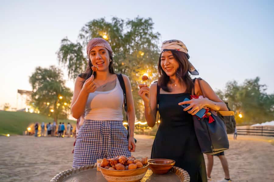 Dubai: Quad Bike Safari, Camels & Al Khayma Camp BBQ Dinner - Sandboarding across soft desert sand