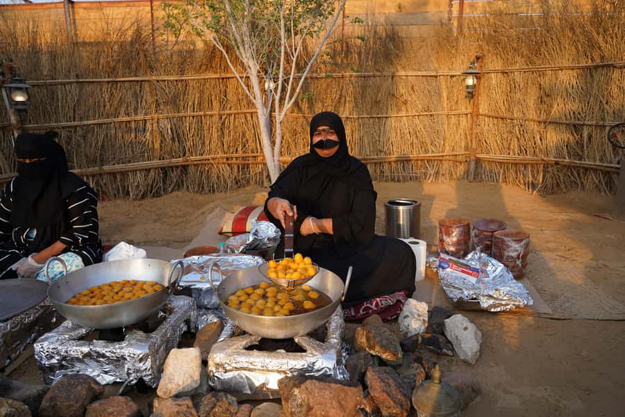 Dubai: Quad Bike Safari, Camels & Al Khayma Camp BBQ Dinner - Al Khayma Camp turns dinner into an evening program
