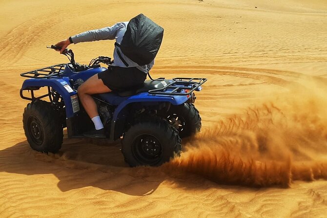 Dubai: Quad Bike Safari, Camels, & Camp with BBQ Dinner - Key points at a glance