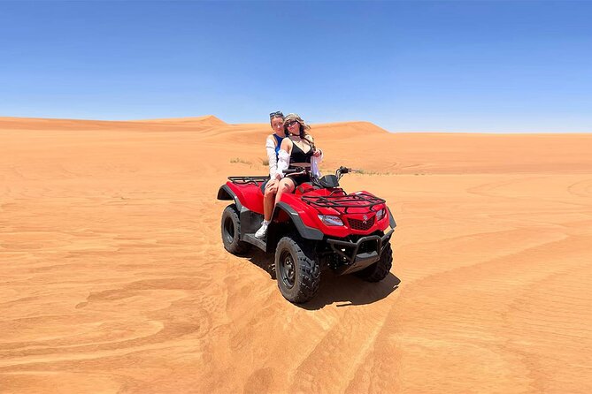 Dubai: Quad Bike Safari, Camels, & Camp with BBQ Dinner - Leaving Dubai for the red dunes