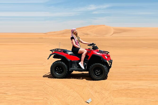Dubai: Quad Bike Safari, Camels, & Camp with BBQ Dinner - Sandboarding and sunset at Lahbab