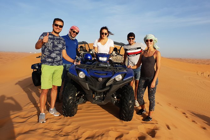 Dubai: Quad Bike Safari, Camels, & Camp with BBQ Dinner - The Bedouin-style camp after sunset