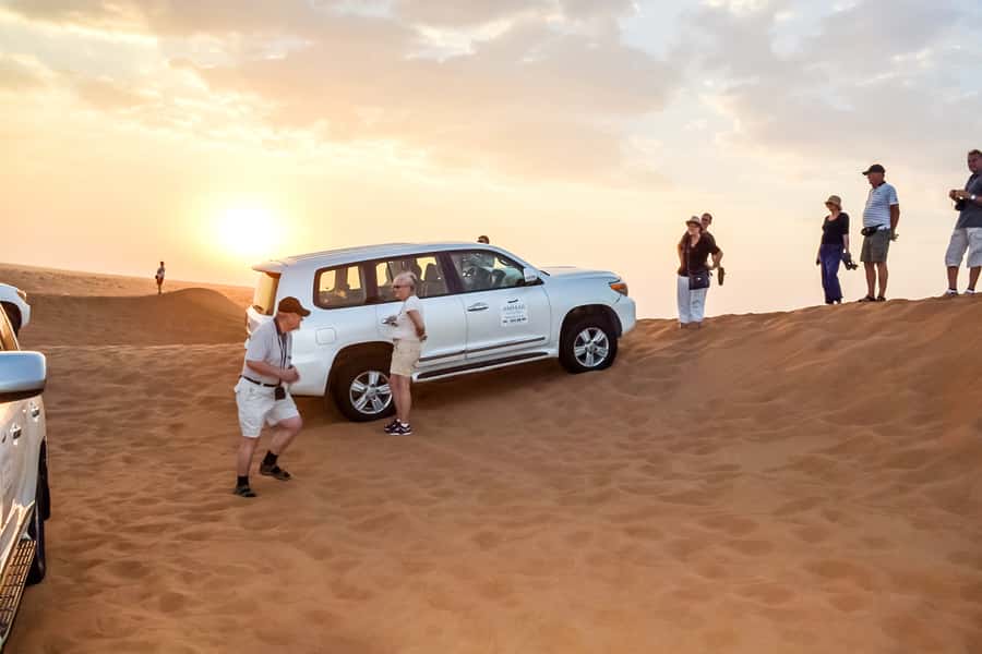 Dubai: Red Dune Safari, Quad Bike, Camel Ride, BBQ Dinner - The 7-hour camp, dinner, and evening entertainment