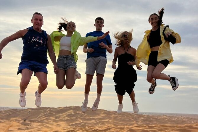Dubai Red Dune Safari with Bedouin BBQ Dinner & Hotel Transfers - Sandboarding and the Best Sunset Photos
