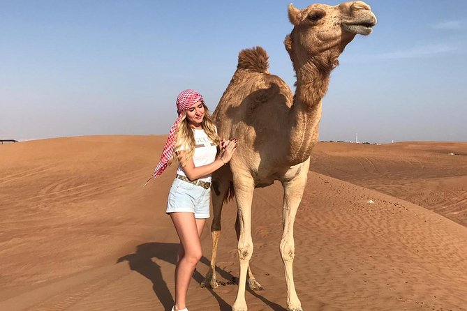 Dubai Red Dunes Desert Safari,ATV Quad Bike Camel Ride&BBQ Dinner - The 30-minute quad-bike session