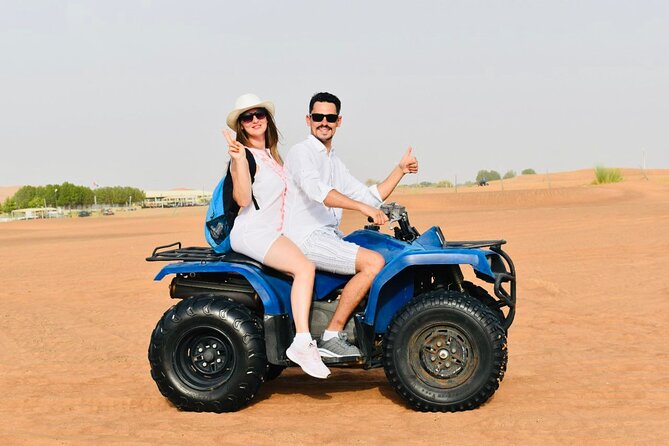 Dubai: Red Dunes Desert Safari, Camel ride, Sandboard, Quad Bike - Sandboarding and the Sunset Photo Stop