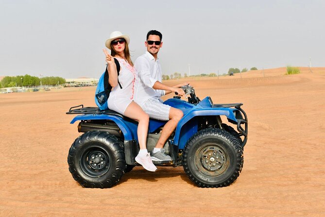 Dubai: Red Dunes Desert Safari, Camel ride, Sandboard, Quad Bike - Short Camel Rides With a Traditional Touch