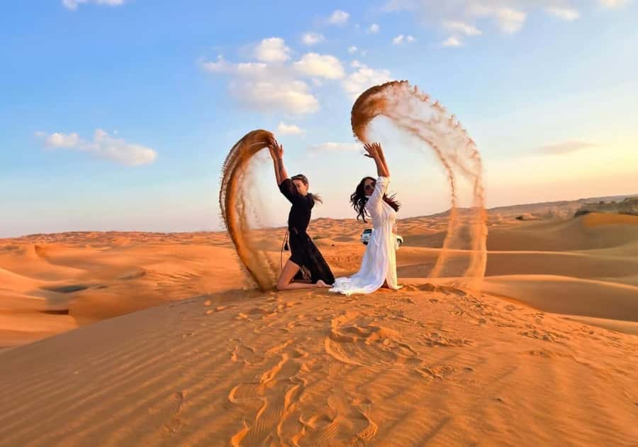Dubai: Red Dunes Evening Quad Bike, Dune Blast with BBQ - Dune bashing and the sunset photo stop