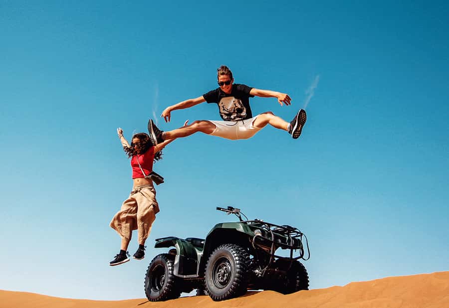 Dubai: Red Dunes Quad Bike with Sandboarding, Camels and BBQ - Key points at a glance
