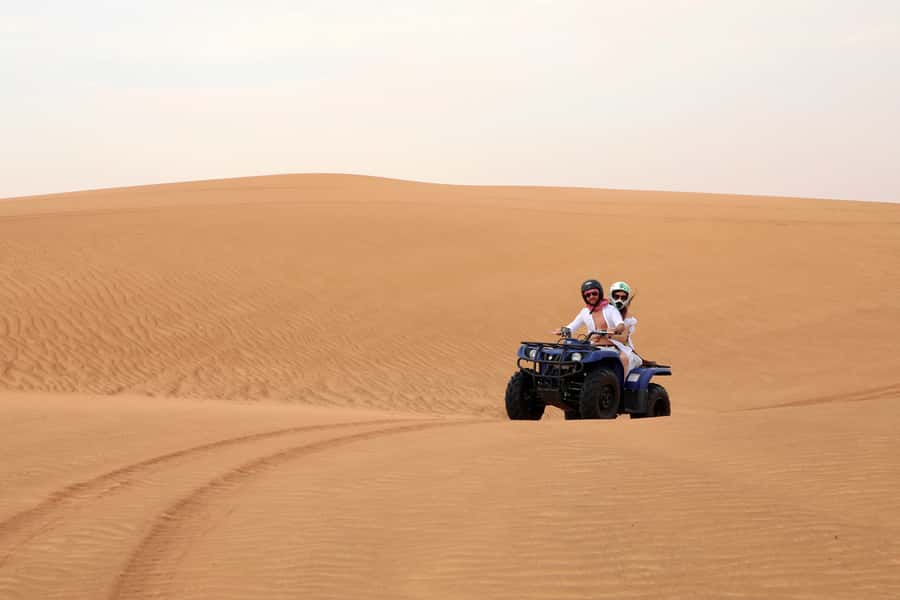 Dubai: Red Dunes Quad Bike with Sandboarding, Camels and BBQ - Who should book this desert safari
