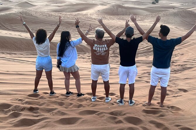 Dubai Red Dunes Safari, ATV, Camel ride, BBQ at Desert Camp - Tanura, belly dance, and fire shows depend on the date