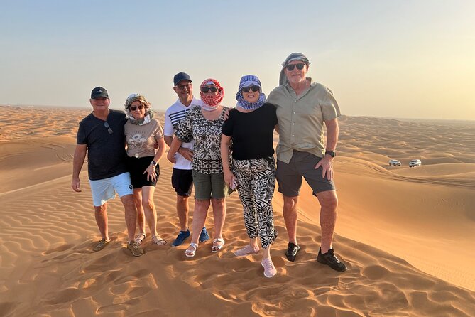 Dubai Red Dunes Safari, Camel Ride & Live BBQ - Sandboarding across the red dunes
