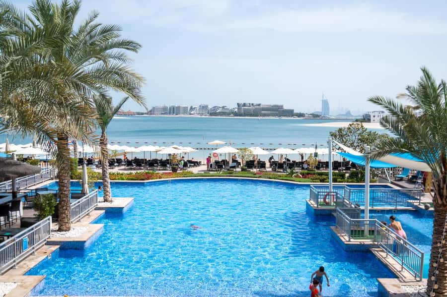 Dubai: Riva Beach Club Pool and Beach Day Pass - The private beach and warm Gulf water