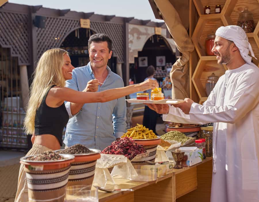 Dubai’s Best Desert Safari: Live Show & Gourmet BBQ Dinner - Sandboarding and desert photographs