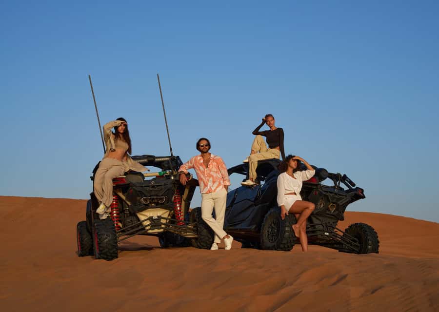 Dubai’s Best Desert Safari: Live Show & Gourmet BBQ Dinner - Camel rides and camp activities