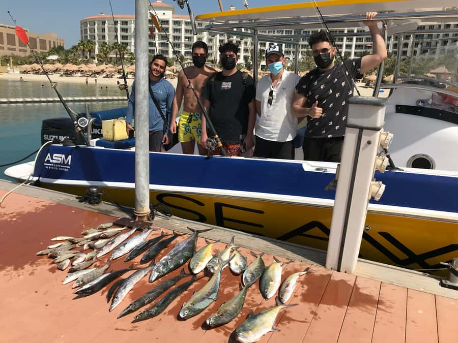Dubai's BEST Fishing Charter – No Fish, No Pay! - Calling the captain and getting on the water